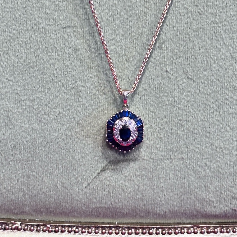 Elegant silver and gold sapphire and diamond rest